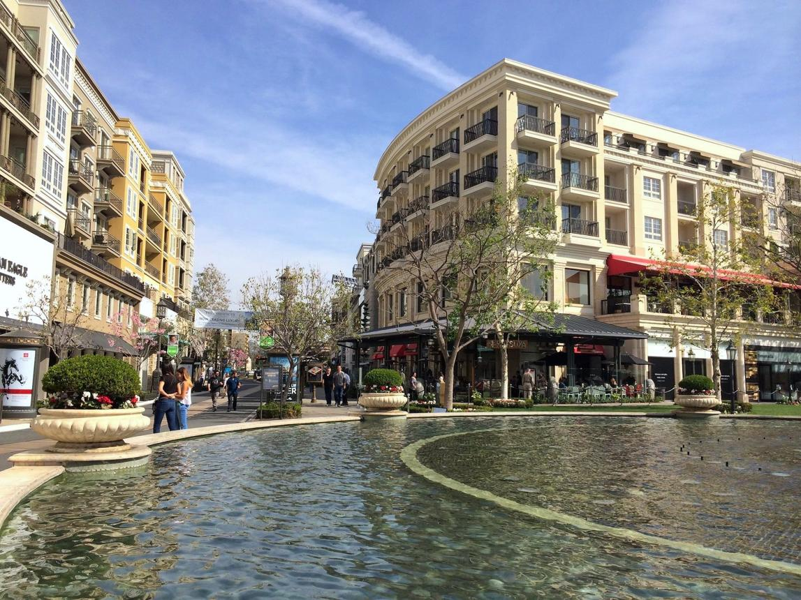 The Americana at Brand in Glendale with fountain, shops, and outdoor dining